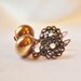 Gorgeous champagne pearl dangle earrings with copper fiilgree and crystal embellishment