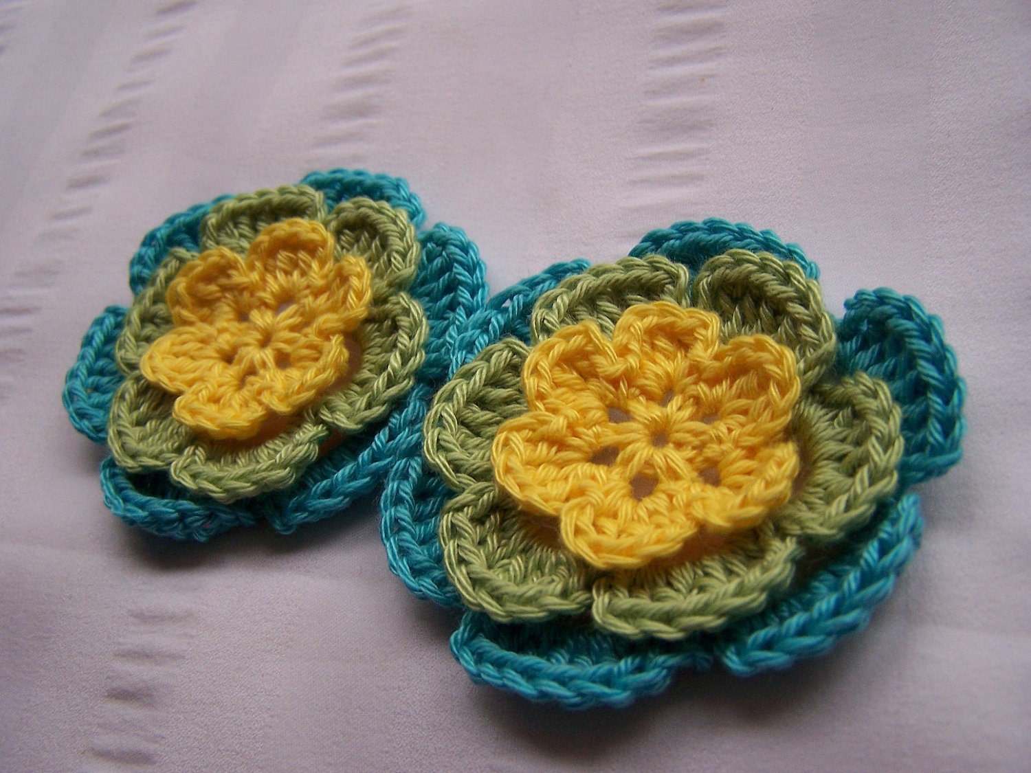 Appliques 2 hand crocheted flowers 2.5 inch embellishment sew on cotton yellow green aqua