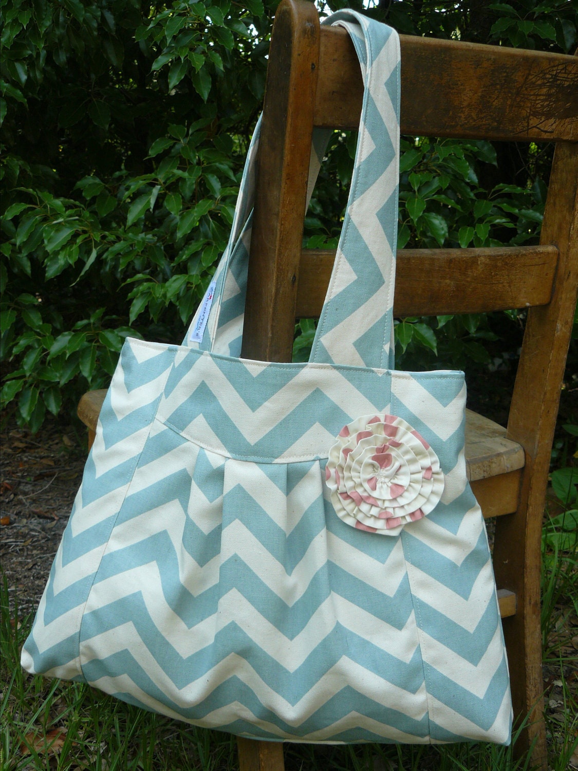 The JuJu Blue Chevron,  pleated Diaper Bag with Pink polka dot  rosette