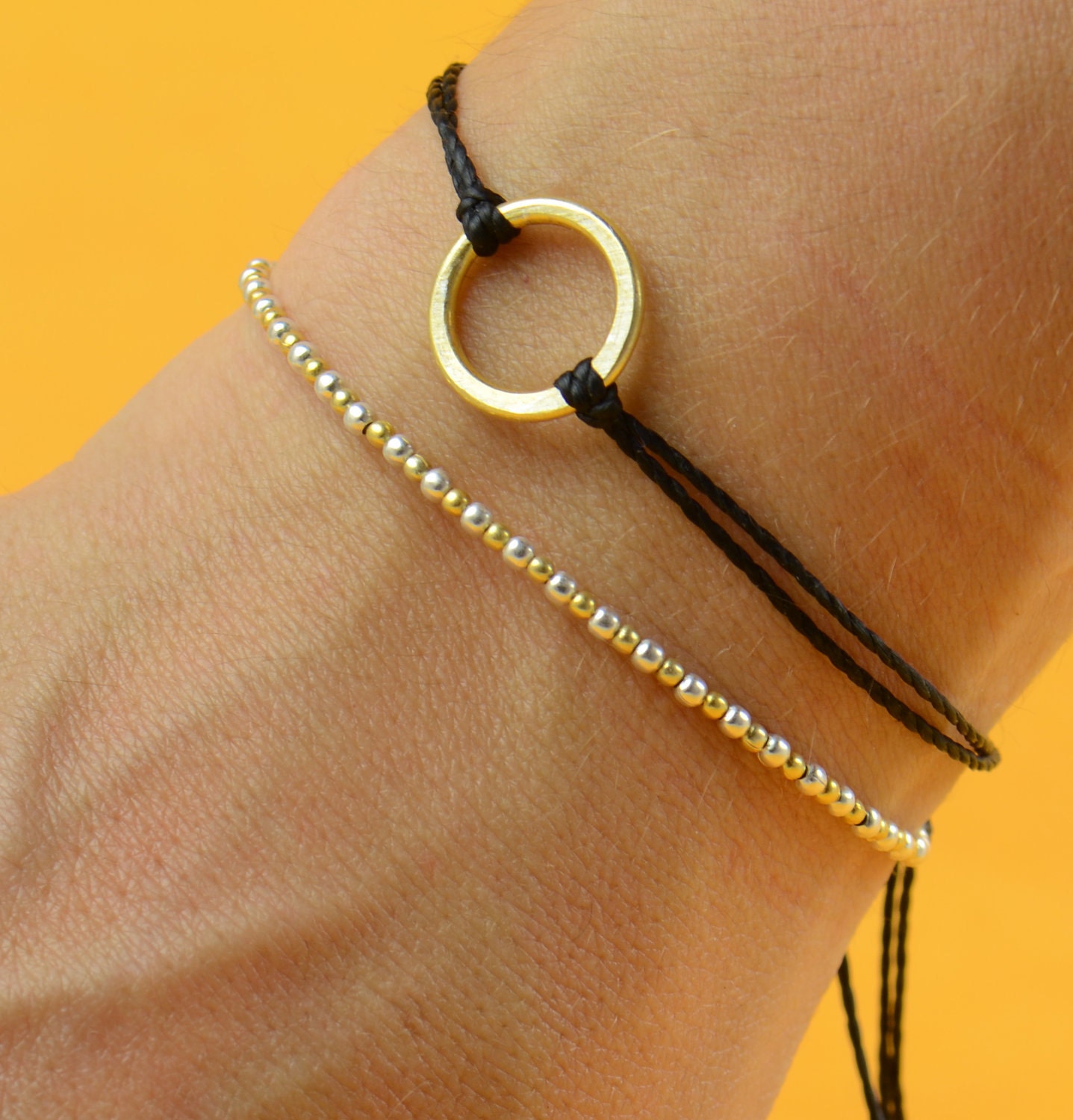 Gold and silver bracelet . black