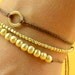 Gold beads bracelet
