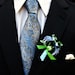 Love Birds Boutonniere with Vine Heart Detail