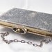 1920s silver and brass floral repoussee evening wallet purse