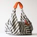Kallia in Striped canvas and Orange leather details
