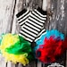 Add Matching Ruffed Leg Warmers to Your Order