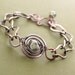 Lampwork copper bracelet with a handmade chain in adjustable length.