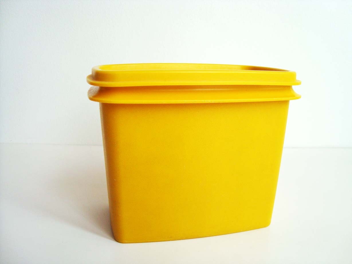 Yellow-Orange Tupperware Container
