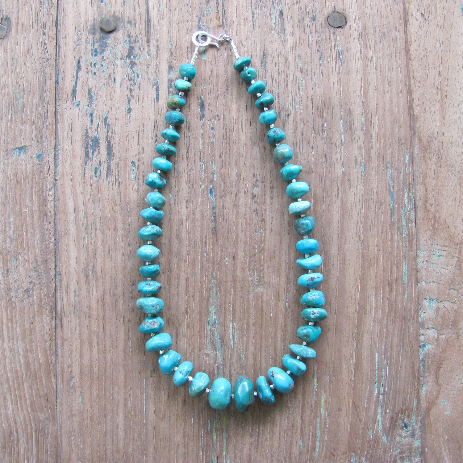 a statement in turquoise necklace