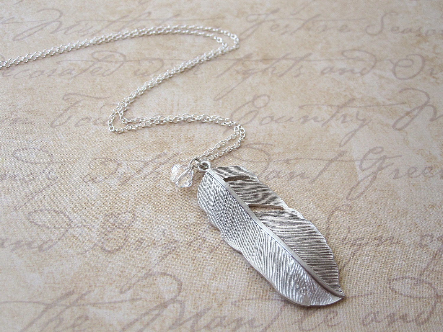 Silver Plated Feather Pendant with Swarovski Accent Also Available in Gold