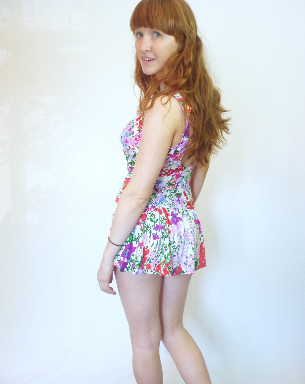 vintage 1950s bright floral swimsuit / 50s bombshell pin up bathing suit with skirt / size medium - large