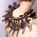 Golden Statement Necklace - yellow egyptian style collar necklace in titanium photograph resin inlay, silver leaf