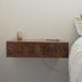 Floating bedside tables in walnut, dovetailed drawers.  nightstand
