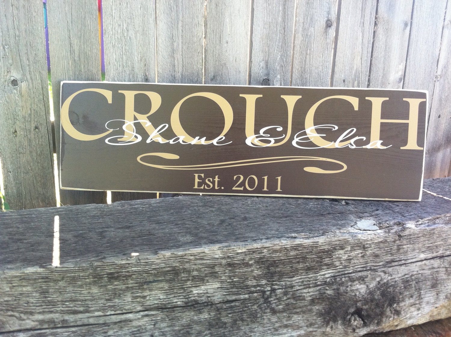 Personalized wood sign made with last name, first names of couple and year of wedding