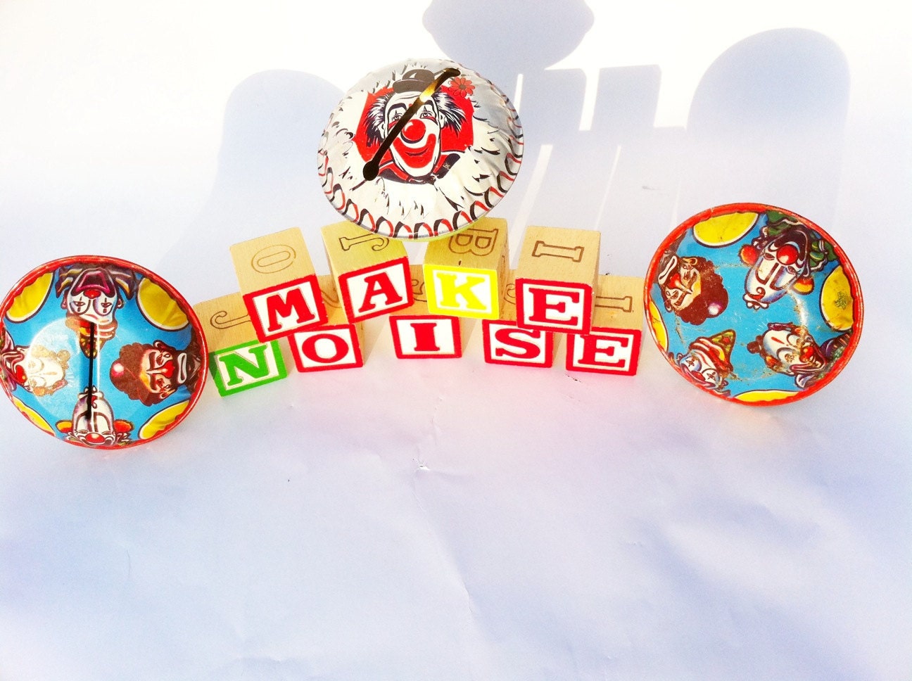 Vintage clown toy noisemakers.  Set of 3 rattler metal tin noise makers - instant collection.  Kirchhof.