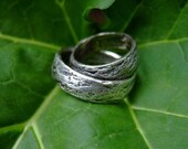 Set of silver textured wedding rings: Stone Stone