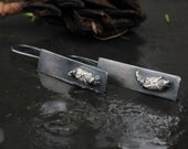 Long rectangular silver earrings: Rose is a Rose is a...