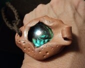 Interior view or Scrying eye fleshy pendant
