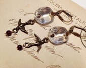 Crystal earrings with birds and garnets