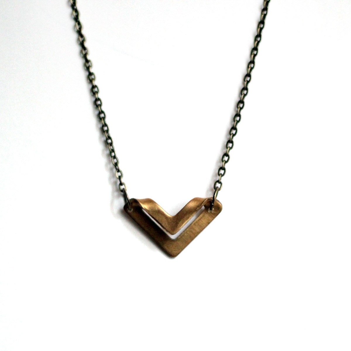 folded brass triangle necklace