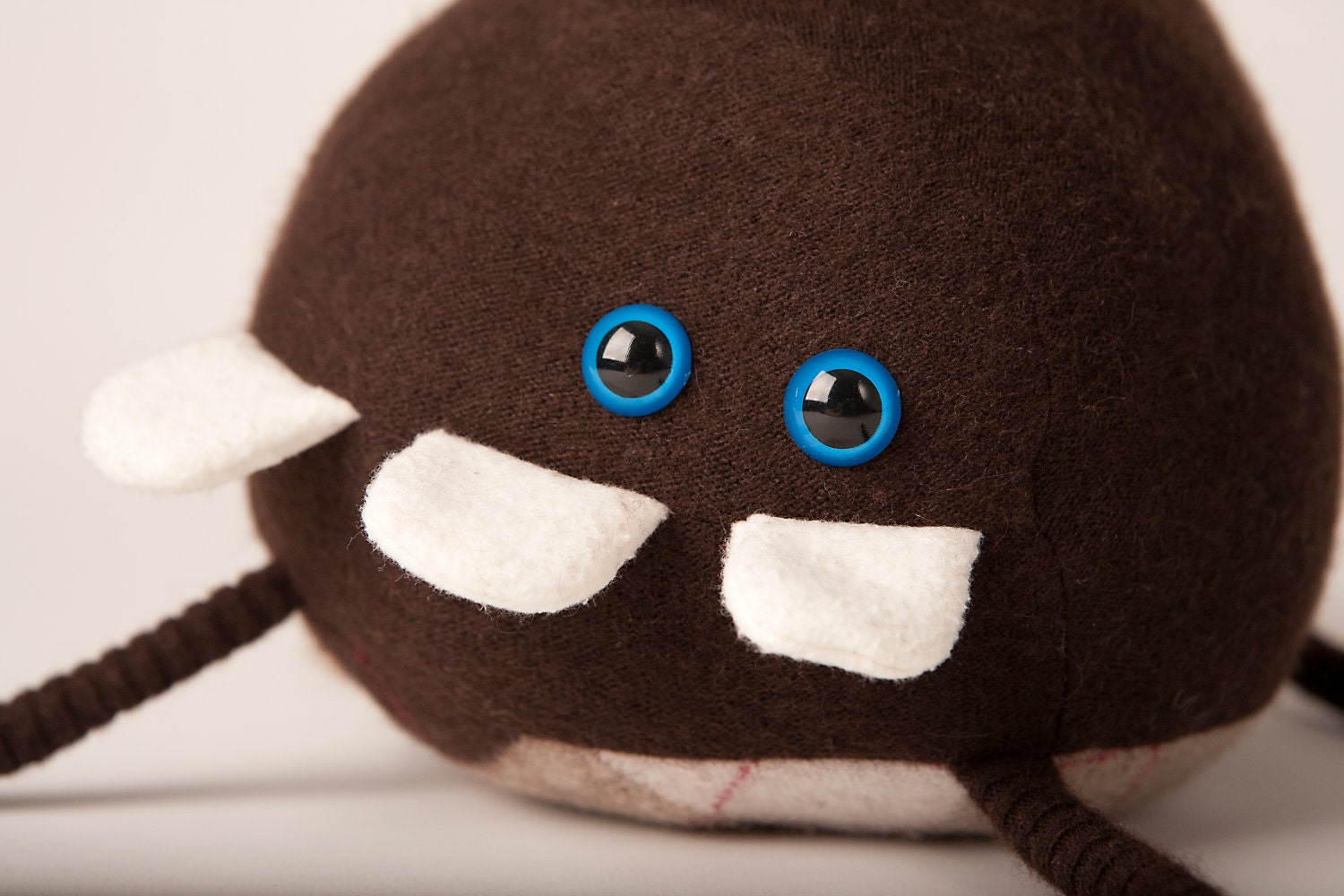 Ricardo the monster stuffed toy made from upcycled wool sweaters