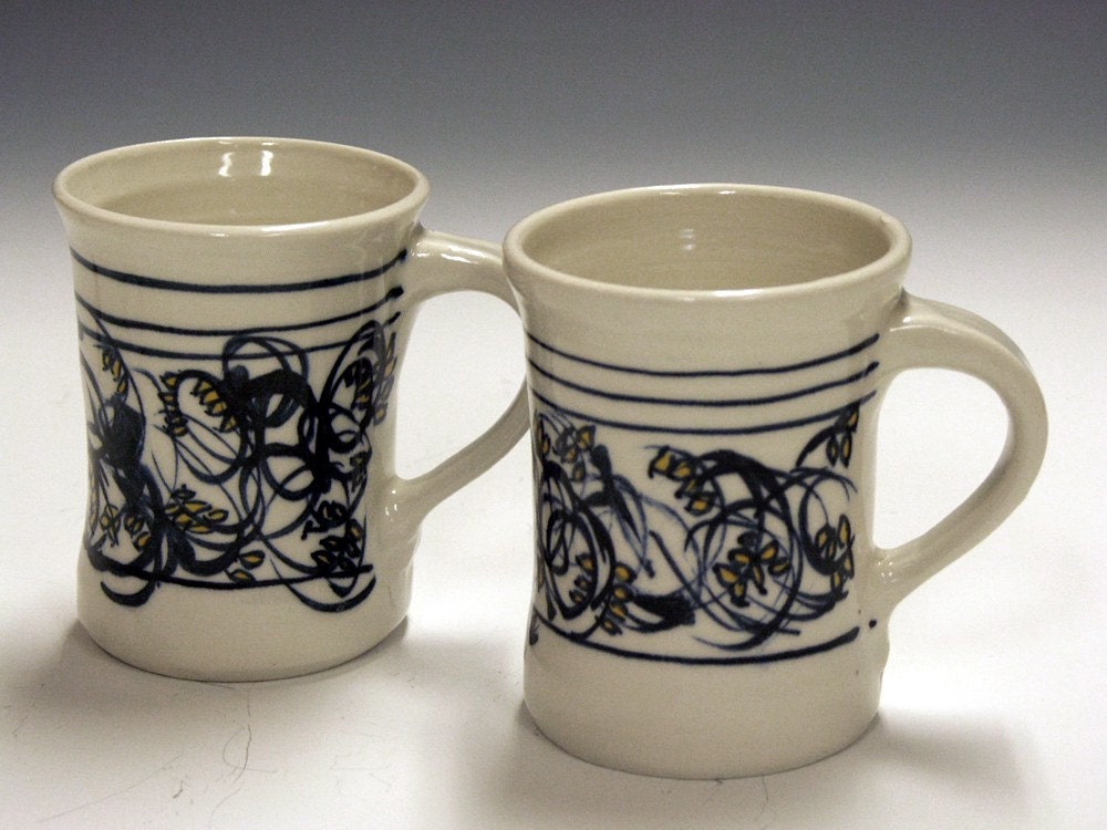 Porcelain ceramic pottery coffee mug a set of two.