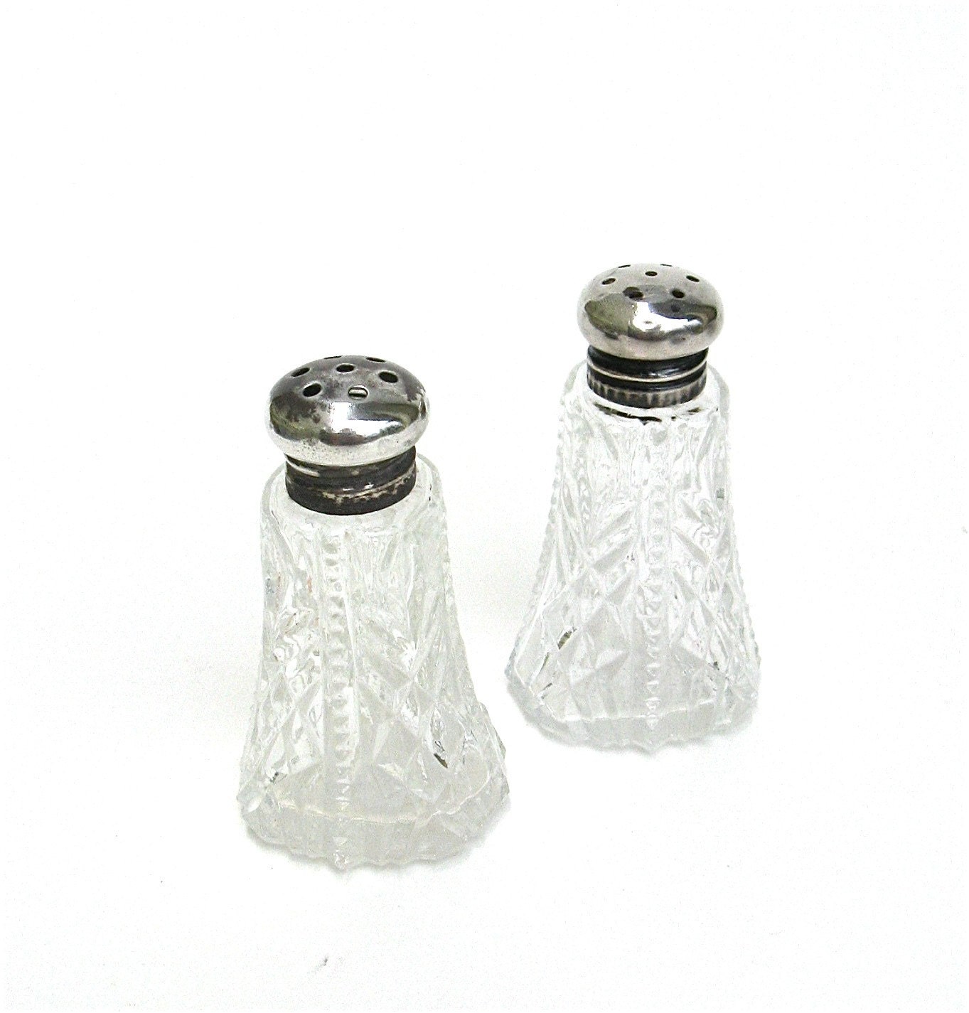 please pass the salt and pepper  ...  vintage glass and sterling shakers