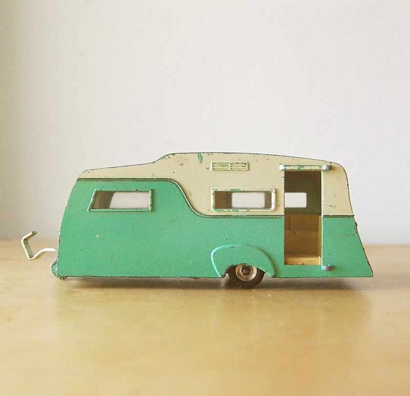 Vintage 1960s Collectible Retro Diecast Dinky Caravan Camper RV Trailer in Turquoise and Cream for Summer Camping Vacation.
