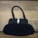 little black purse