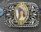 Assemblage Bracelet featuring French Steel Cut Buckle, Porcelain Portrait Cameo and Rosaries