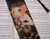 Slightly Toxic -  Hand crafted laminated fairy goth poison bookmark with tassel.