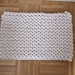 Giant knit rope rug - 30 by 20 inches