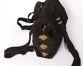 On Sale was 190 usd .Cuelebra suede backpack  & shoulder bag