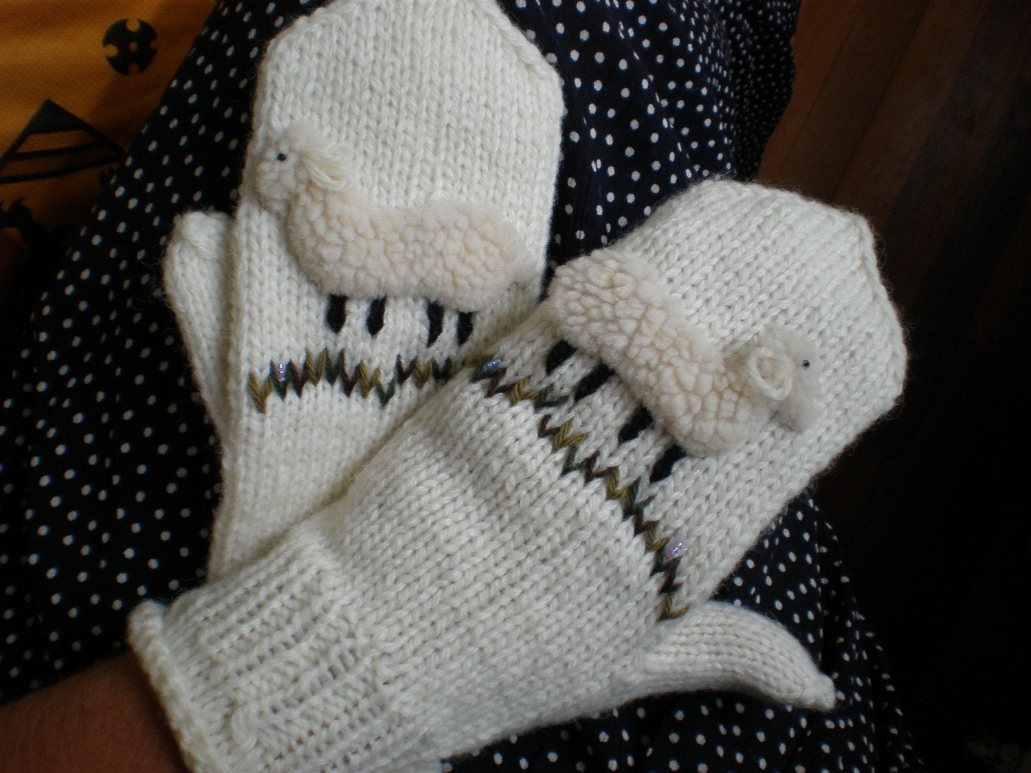 Hand-knitted white women gloves with hand needlecrafted furry sheep
