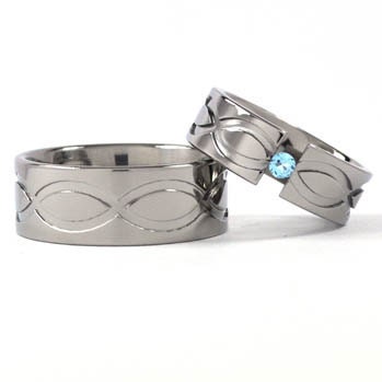 New Infinity His and Hers Tension Set Titanium Wedding Rings