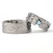 New Infinity His and Hers Tension Set Titanium Wedding Rings