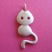 Little cat with leather cord