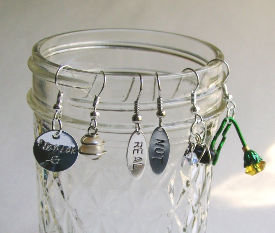 design your own Hunger Games earrings with Katniss Peeta Gale and other charms
