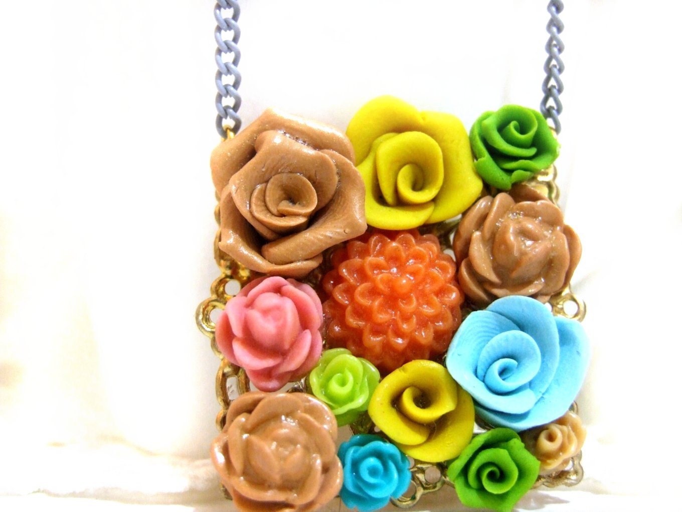 flower garden polymer clay cabochon filigree necklace with a grey chain