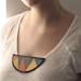 Leather necklace in half moon shape with triangle pattern - multicolored & black
