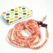 Tangle-Free  Earbud Cozy, Coral and Pink