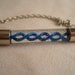 Resident Evil Blue T Virus Shield Necklace