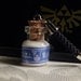 Miniature Legend of Zelda Lon Lon Milk Bottle Cell Charm Keychain