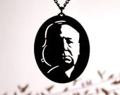 Alfred Hitchcock homage silhouette necklace in black stainless steel - horror film noir geekery portrait