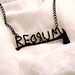 REDRUM text necklace with axe inspired by The Shining in black stainless steel