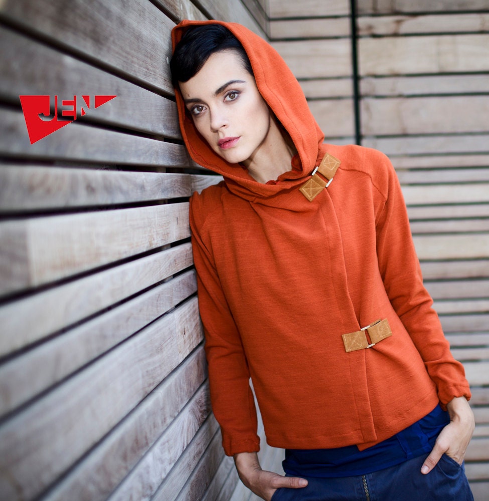 Terra cotta orange hood french terry sweater with camel leather claps