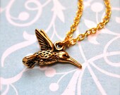 The Tiniest Golden Hummingbird Necklace