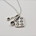 The Baker's Necklace - Measuring Spoons and Baking Pan