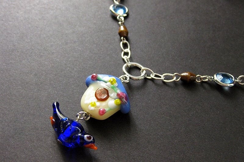Lampwork Birdhouse and Blue Bird Necklace. Handmade Artisan Jewelry by Gilliauna