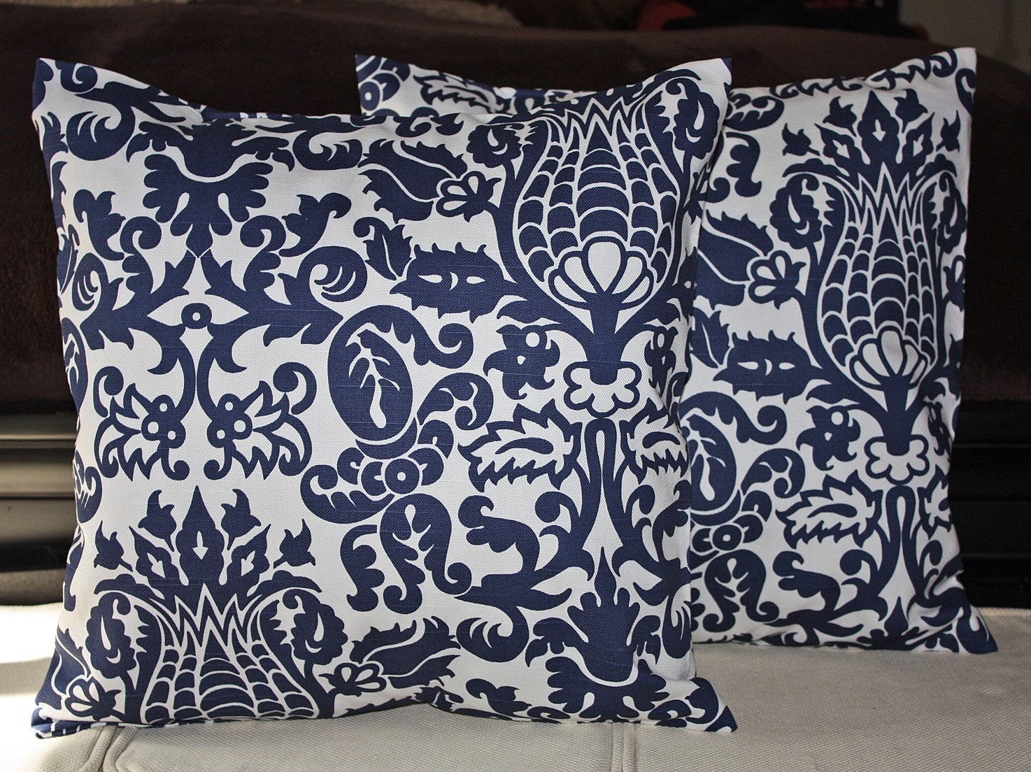 FREE U.S. SHIPPING Set of Two 24x24 inch Designer Pillow Covers - Linen Appearance Snorkle Blue on a White Background.