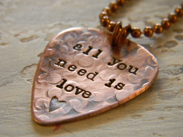 hand stamped guitar pick necklace